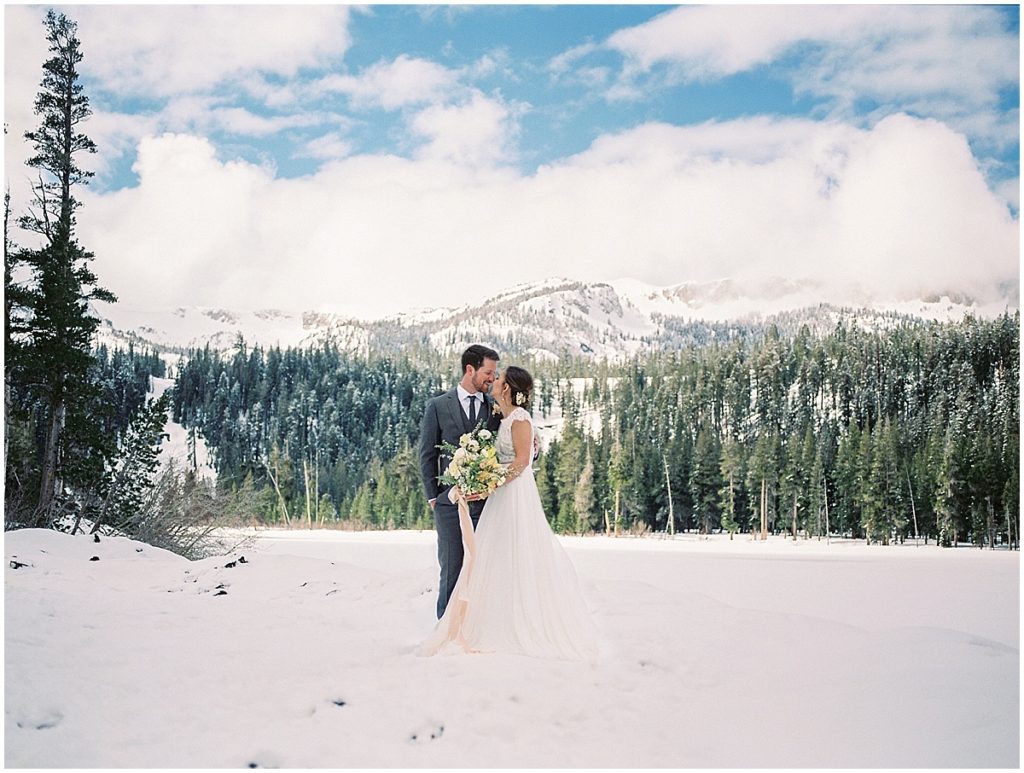Mountain snow winter wedding couple